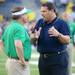 Michigan Head Coach Brady Hoke talks with Notre Dame Head Coach Brian Kelly Saturday evening before kickoff.
Melanie Maxwell | AnnArbor.com